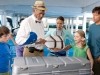 Nathan Gamble, Morgan Freeman and Harry Connick Jr Dolphin Tale Photo