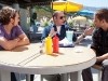 Aaron Johnson, John Travolta and Taylor Kitsch Photo