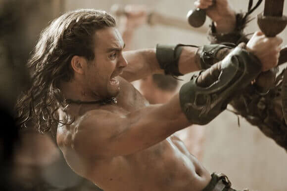 Dustin Clare in Spartacus: Gods of the Arena