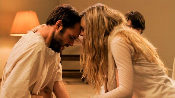 Christopher Denham and Brit Marling in Sound of My Voice