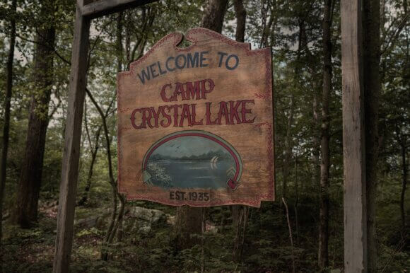 Welcome sign to Camp Crystal Lake
