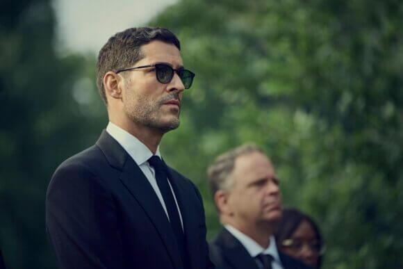 Tom Ellis as Colin Glass